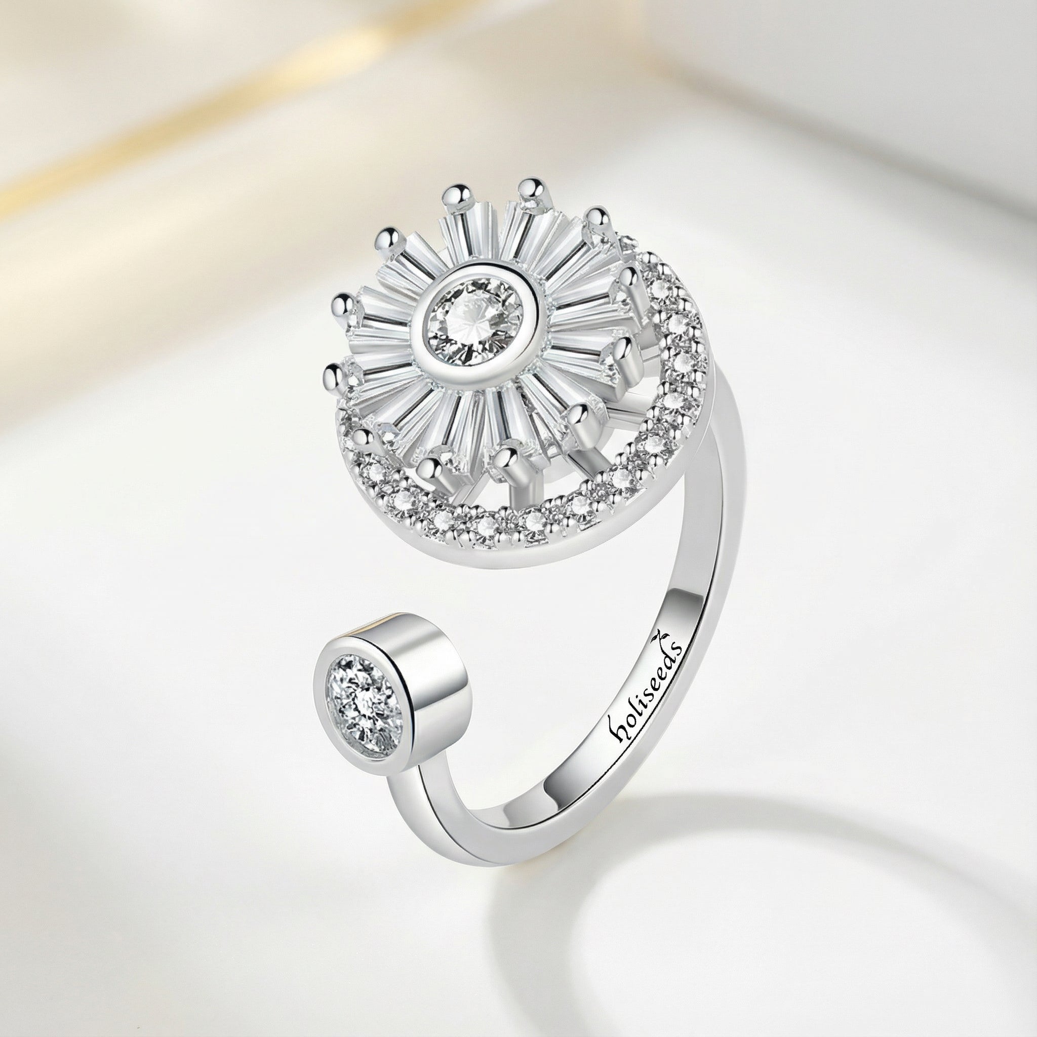 Éclat Stellaire – Bague Argentée Rotative I holiseeds